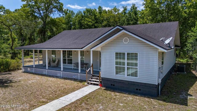 5398 Laurie Ln, Middleburg, FL 32068 - view of front of house featuring crawl space, covered porch, roof with shingles, and central AC