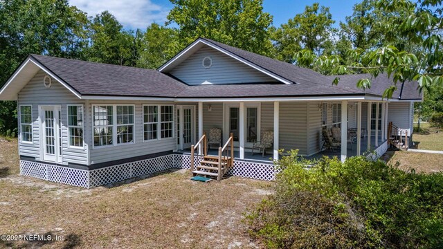 5398 Laurie Ln, Middleburg, FL 32068 - rear view of property featuring a shingled roof and covered porch
