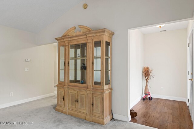 5398 Laurie Ln, Middleburg, FL 32068 - empty room featuring baseboards and lofted ceiling