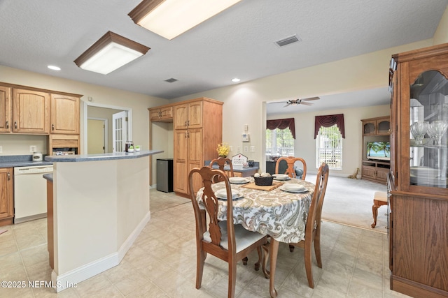 5398 Laurie Ln, Middleburg, FL 32068 - dining room featuring recessed lighting, baseboards, a textured ceiling, and a ceiling fan