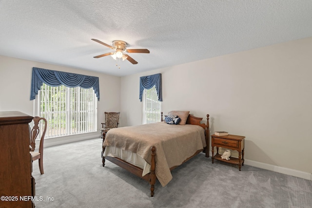 5398 Laurie Ln, Middleburg, FL 32068 - carpeted bedroom featuring access to outside, a textured ceiling, ceiling fan, and baseboards