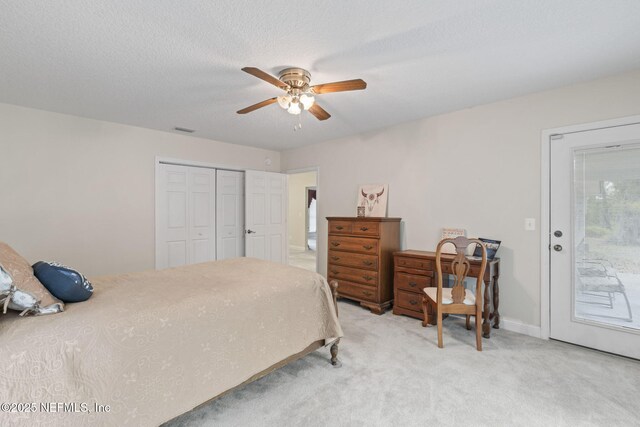 5398 Laurie Ln, Middleburg, FL 32068 - bedroom featuring access to exterior, light carpet, a closet, and a ceiling fan