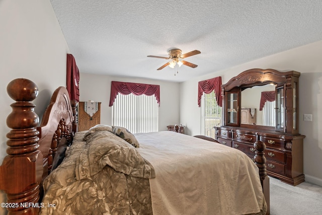 5398 Laurie Ln, Middleburg, FL 32068 - carpeted bedroom with a textured ceiling and a ceiling fan