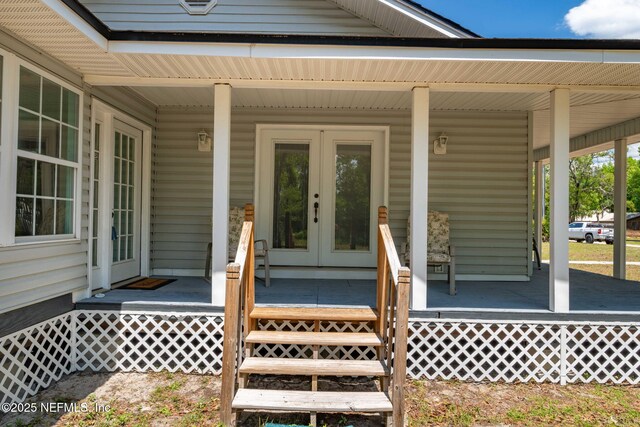 5398 Laurie Ln, Middleburg, FL 32068 - property entrance with covered porch and french doors