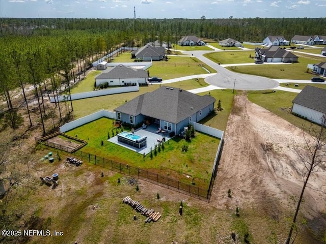aerial view featuring a forest view