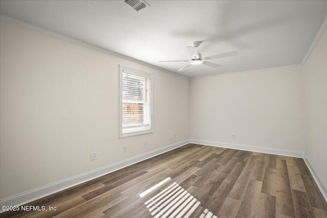 14319 Cedar Island Rd N, Jacksonville, FL 32250 - empty room with visible vents, baseboards, ornamental molding, wood finished floors, and a ceiling fan
