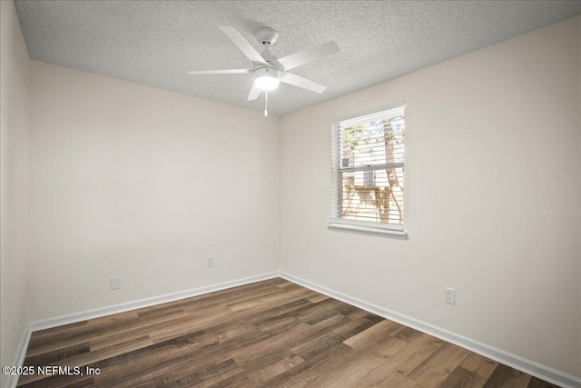 14319 Cedar Island Rd N, Jacksonville, FL 32250 - unfurnished room with dark wood finished floors, baseboards, a ceiling fan, and a textured ceiling