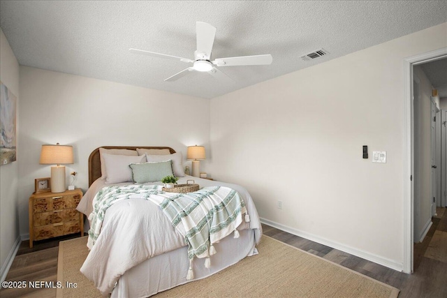 14319 Cedar Island Rd N, Jacksonville, FL 32250 - bedroom featuring baseboards, visible vents, wood finished floors, and a textured ceiling
