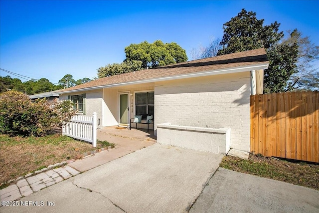 14319 Cedar Island Rd N, Jacksonville, FL 32250 - ranch-style house with brick siding and fence