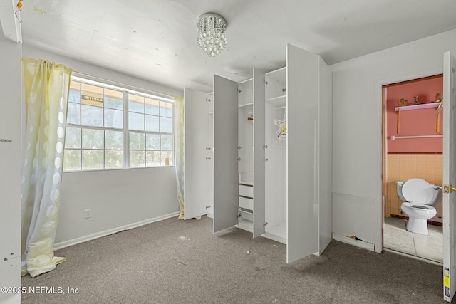 2685 Sandra Ln, Jacksonville, FL 32208 - unfurnished bedroom featuring carpet and ensuite bath