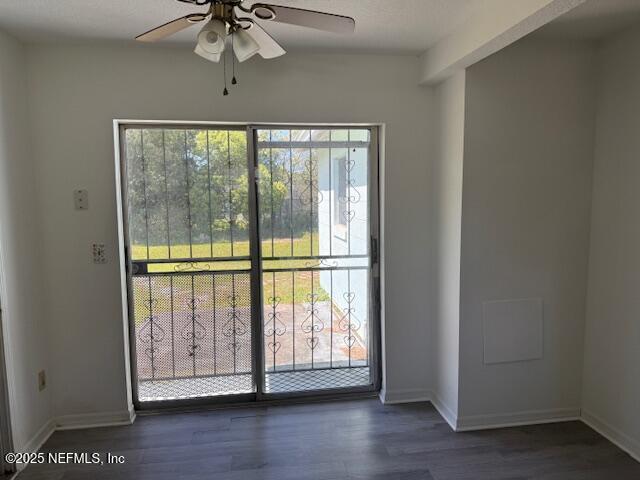 9504 Flechette Ave, Jacksonville, FL 32208 - entryway with wood finished floors, baseboards, and ceiling fan