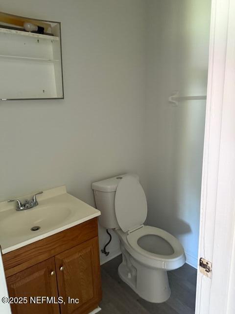 9504 Flechette Ave, Jacksonville, FL 32208 - half bath featuring toilet and vanity