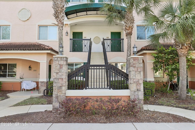9745 Touchton Rd Unit 1629, Jacksonville, FL 32246 - view of front of property featuring stucco siding and stairway