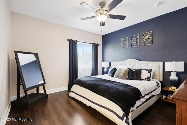 9745 Touchton Rd Unit 1629, Jacksonville, FL 32246 - bedroom featuring baseboards, a ceiling fan, and wood finished floors