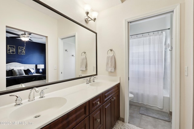 9745 Touchton Rd Unit 1629, Jacksonville, FL 32246 - full bathroom with a sink, toilet, double vanity, and ensuite bath