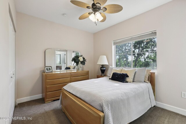 9745 Touchton Rd Unit 1629, Jacksonville, FL 32246 - carpeted bedroom featuring baseboards and a ceiling fan