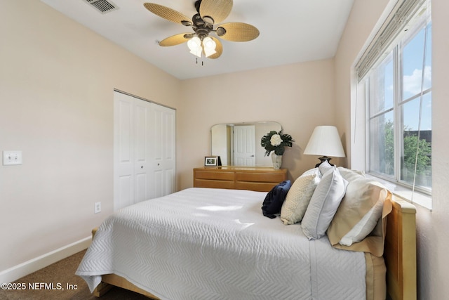 9745 Touchton Rd Unit 1629, Jacksonville, FL 32246 - bedroom with a closet, baseboards, carpet flooring, visible vents, and ceiling fan