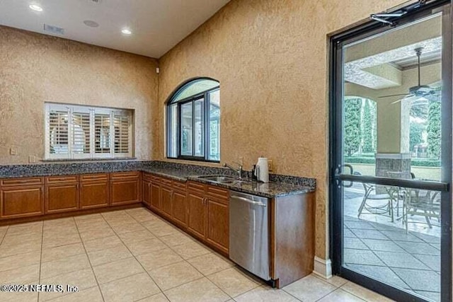 9745 Touchton Rd Unit 1629, Jacksonville, FL 32246 - interior space featuring visible vents, light tile patterned floors, dishwasher, a sink, and a ceiling fan