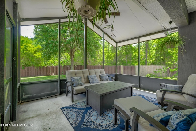 sunroom / solarium featuring an outdoor living space