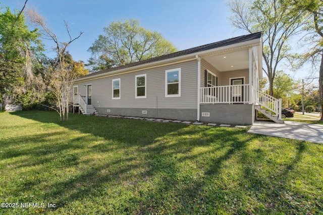 2939 Fitzgerald St, Jacksonville, FL 32254 - view of home's exterior featuring covered porch, crawl space, and a yard