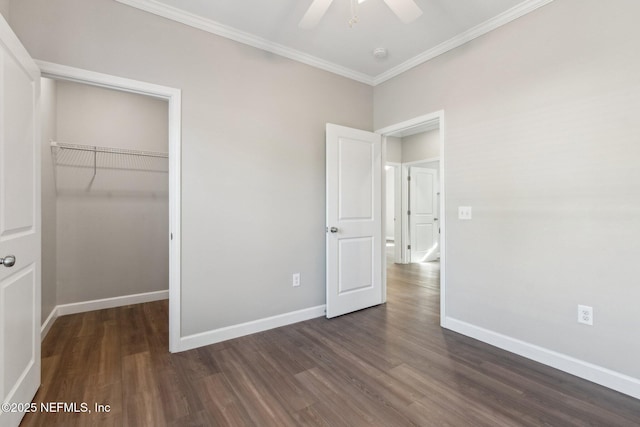 2939 Fitzgerald St, Jacksonville, FL 32254 - unfurnished bedroom with a closet, ornamental molding, baseboards, and dark wood finished floors