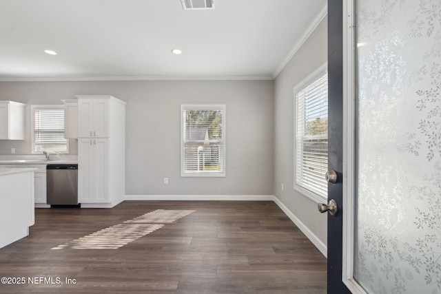 2939 Fitzgerald St, Jacksonville, FL 32254 - kitchen featuring stainless steel dishwasher, baseboards, plenty of natural light, and ornamental molding