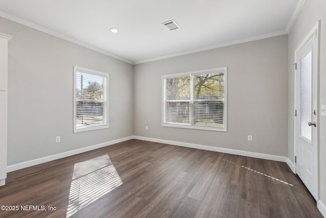 2939 Fitzgerald St, Jacksonville, FL 32254 - unfurnished room featuring ornamental molding, baseboards, a healthy amount of sunlight, and dark wood-type flooring