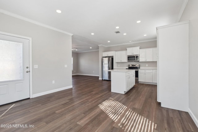 2939 Fitzgerald St, Jacksonville, FL 32254 - kitchen with open floor plan, a center island, dark wood-type flooring, visible vents, and appliances with stainless steel finishes