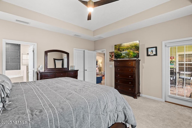 bedroom with visible vents, baseboards, light colored carpet, and access to exterior