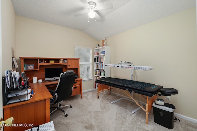 office with carpet, ceiling fan, lofted ceiling, baseboards, and a textured ceiling