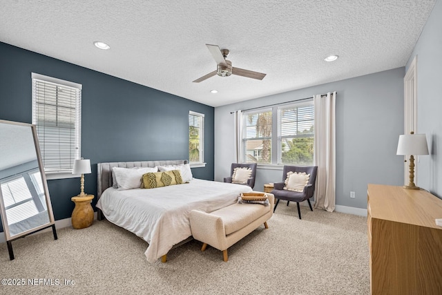 bedroom with carpet, a textured ceiling, baseboards, ceiling fan, and recessed lighting