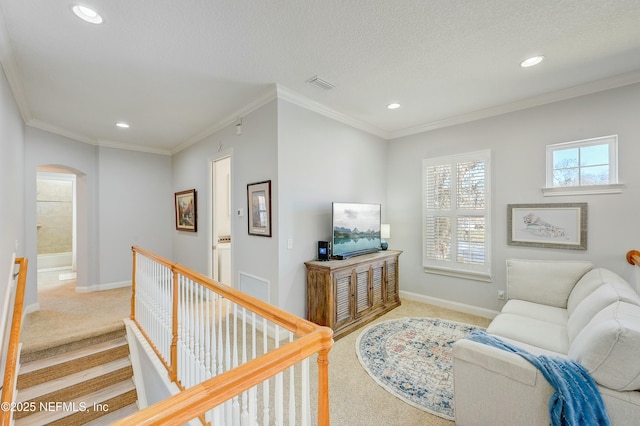 96064 Bottlebrush Ln, Fernandina Beach, FL 32034 - interior space with light carpet, visible vents, arched walkways, and baseboards