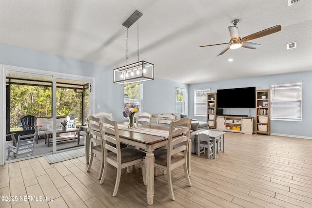 208 Seville Pkwy, Saint Augustine, FL 32086 - dining area featuring light wood finished floors, a wealth of natural light, visible vents, and ceiling fan