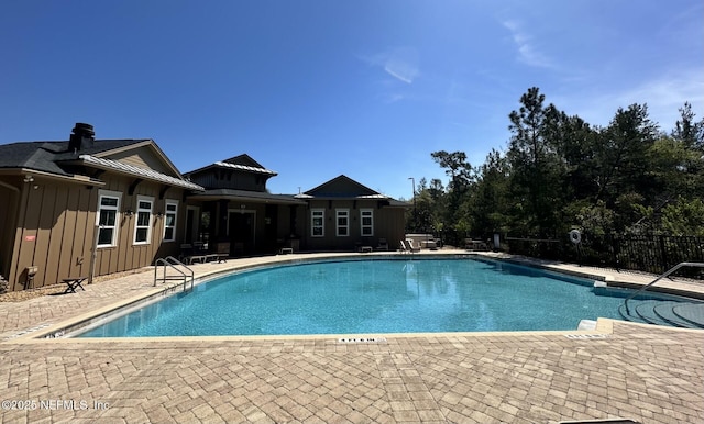 208 Seville Pkwy, Saint Augustine, FL 32086 - pool featuring fence and a patio