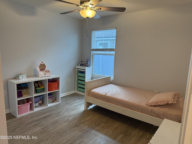 208 Seville Pkwy, Saint Augustine, FL 32086 - bedroom with wood finished floors and ceiling fan