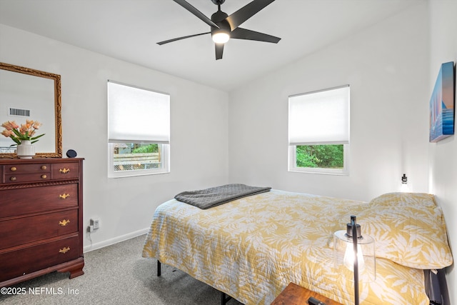 bedroom featuring carpet, visible vents, a ceiling fan, and baseboards