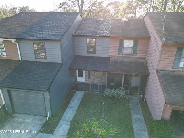 11726 Tanager Dr, Jacksonville, FL 32225 - multi unit property featuring a garage, roof with shingles, and concrete driveway