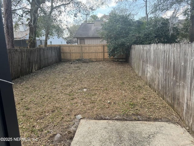11726 Tanager Dr, Jacksonville, FL 32225 - view of yard featuring a fenced backyard