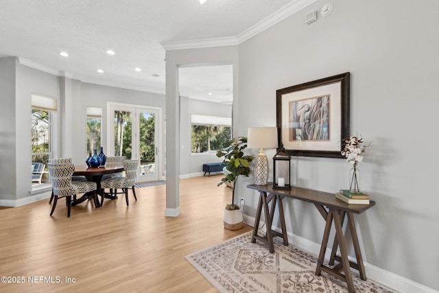 5698 Grand Cayman Rd, Jacksonville, FL 32226 - interior space with recessed lighting, baseboards, light wood-style floors, and crown molding