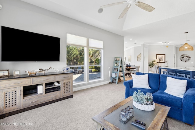 5698 Grand Cayman Rd, Jacksonville, FL 32226 - living area featuring vaulted ceiling, recessed lighting, a ceiling fan, and carpet floors