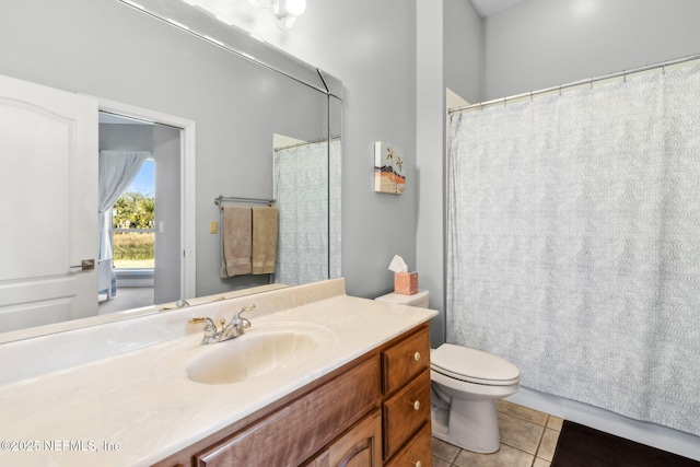 5698 Grand Cayman Rd, Jacksonville, FL 32226 - bathroom featuring tile patterned flooring, toilet, and vanity
