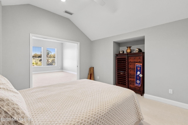 5698 Grand Cayman Rd, Jacksonville, FL 32226 - carpeted bedroom featuring visible vents, a ceiling fan, baseboards, and vaulted ceiling