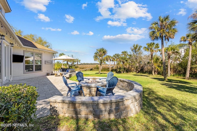 5698 Grand Cayman Rd, Jacksonville, FL 32226 - view of yard with a fire pit and a patio area