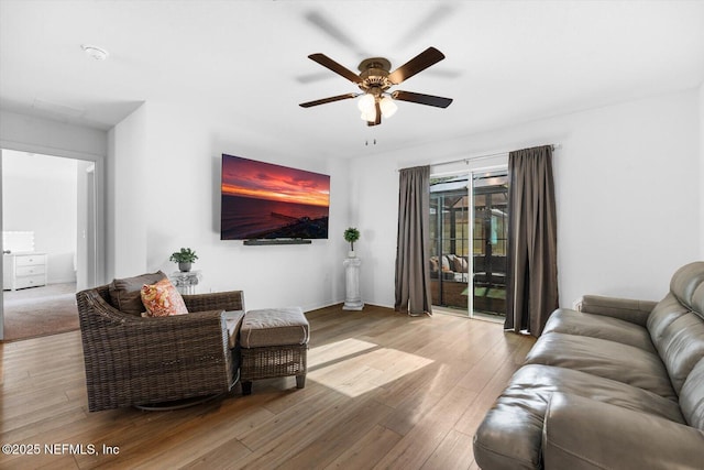 19 Slipper Flower Path E, Palm Coast, FL 32164 - living area featuring wood finished floors and a ceiling fan