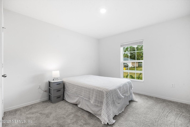 19 Slipper Flower Path E, Palm Coast, FL 32164 - bedroom with light colored carpet and baseboards