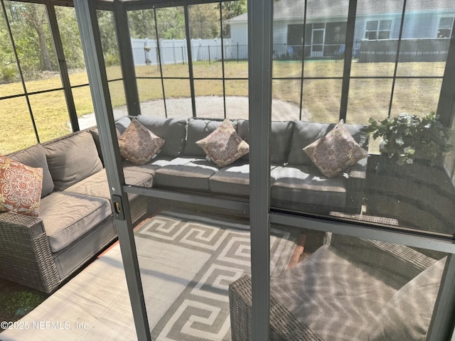 19 Slipper Flower Path E, Palm Coast, FL 32164 - sunroom / solarium with an outdoor hangout area