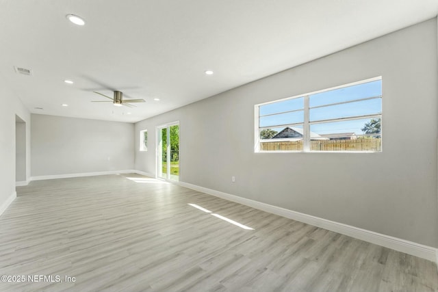 spare room with visible vents, baseboards, ceiling fan, recessed lighting, and light wood-style flooring