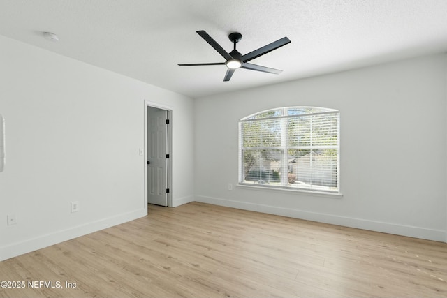 3852 Westridge Dr, Orange Park, FL 32065 - empty room with ceiling fan, baseboards, a textured ceiling, and wood finished floors
