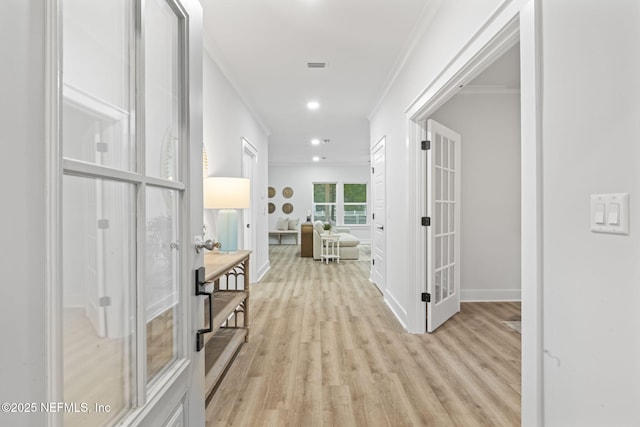 2013 Wedge Ct, Green Cove Springs, FL 32043 - corridor with french doors, ornamental molding, light wood-type flooring, recessed lighting, and baseboards