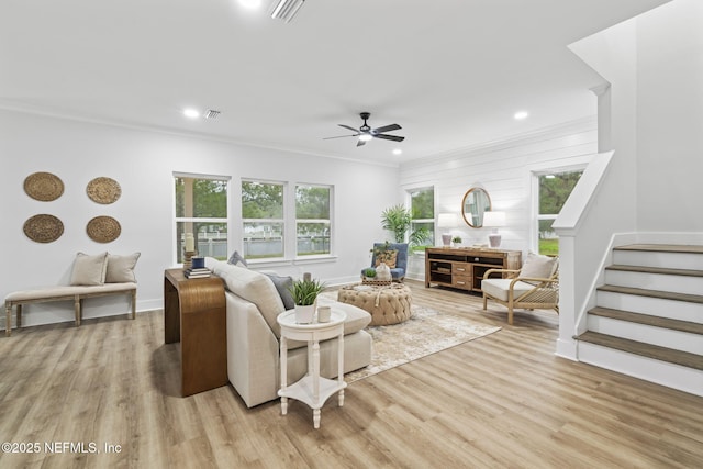 2013 Wedge Ct, Green Cove Springs, FL 32043 - living room featuring ornamental molding, light wood-style flooring, stairs, a ceiling fan, and recessed lighting